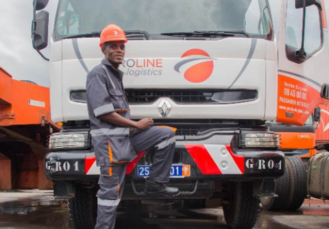 Man in front of a truck. Photo: Mohamed DIabaté/IOM Côte d’Ivoire